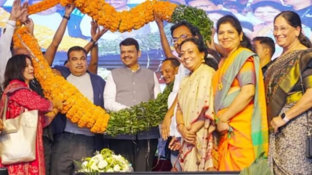 Chief Minister Devendra Fadnavis and Union Minister Nitin Gadkari handed over ownership title deeds to the slum dwellers.